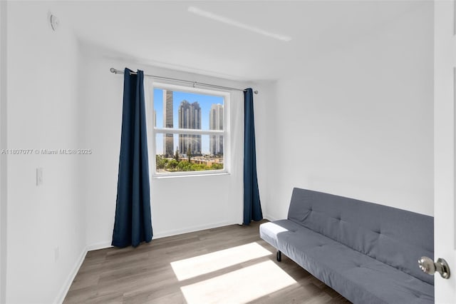 17150 N Bay Rd Unit 2814, Sunny Isles Beach, FL 33160 - sitting room featuring wood finished floors and a city view