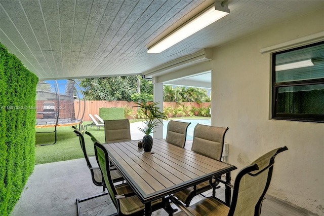 7531 Simms St, Hollywood, FL 33024 - view of patio featuring outdoor dining space