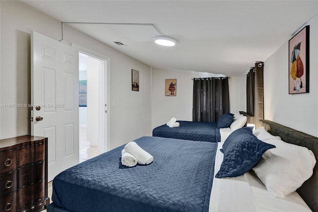 7531 Simms St, Hollywood, FL 33024 - bedroom with light tile patterned flooring