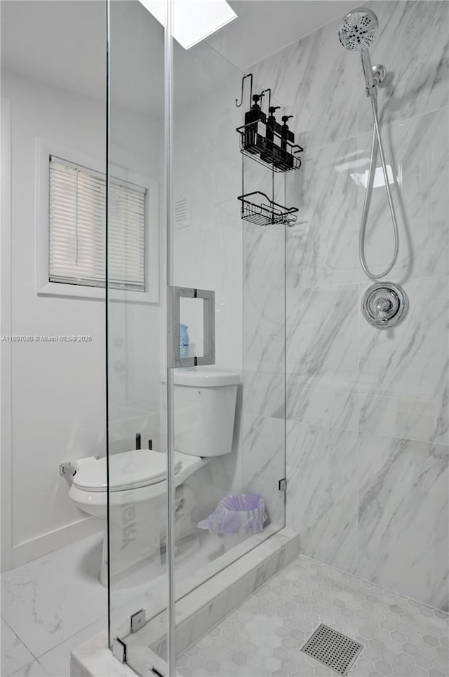7531 Simms St, Hollywood, FL 33024 - full bath with a marble finish shower, toilet, and a skylight