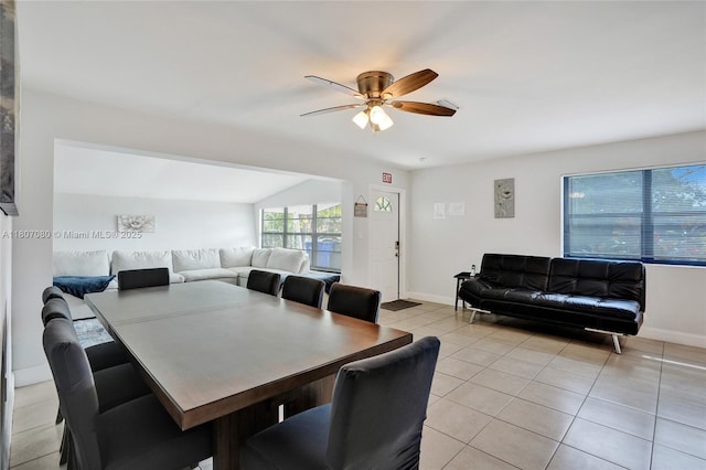 7531 Simms St, Hollywood, FL 33024 - dining room with light tile patterned floors, a ceiling fan, and baseboards