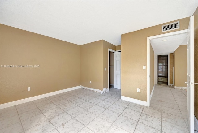 9033 SW 123rd Ct Unit 101, Miami, FL 33186 - unfurnished bedroom featuring baseboards and light tile patterned floors