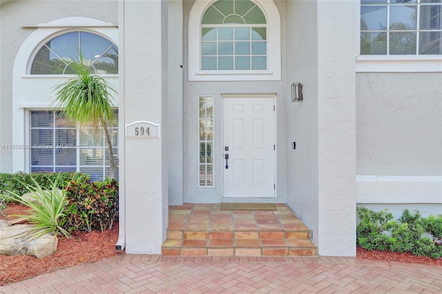 594 Spinnaker, Weston, FL 33326 - view of exterior entry featuring stucco siding