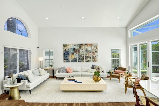 594 Spinnaker, Weston, FL 33326 - living area featuring a towering ceiling, wood finished floors, and recessed lighting