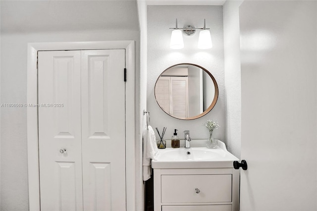 594 Spinnaker, Weston, FL 33326 - bathroom with vanity and a closet