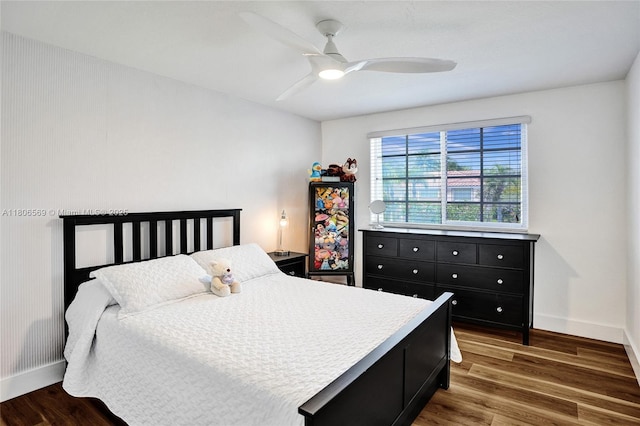 594 Spinnaker, Weston, FL 33326 - bedroom with baseboards, wood finished floors, and ceiling fan