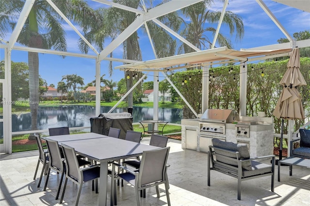 594 Spinnaker, Weston, FL 33326 - view of patio featuring outdoor dining area, a water view, and glass enclosure