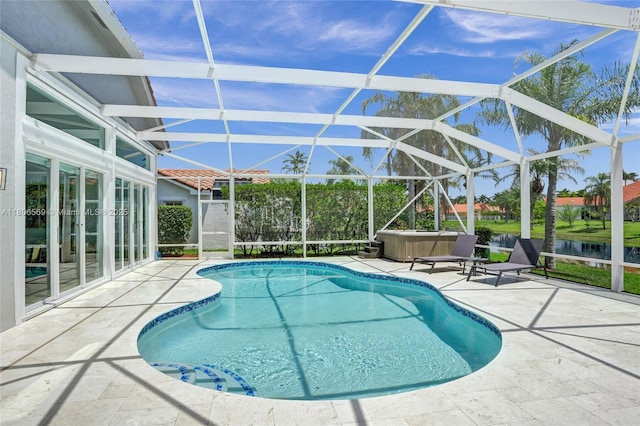 594 Spinnaker, Weston, FL 33326 - swimming pool featuring a patio, a lanai, a hot tub, and french doors