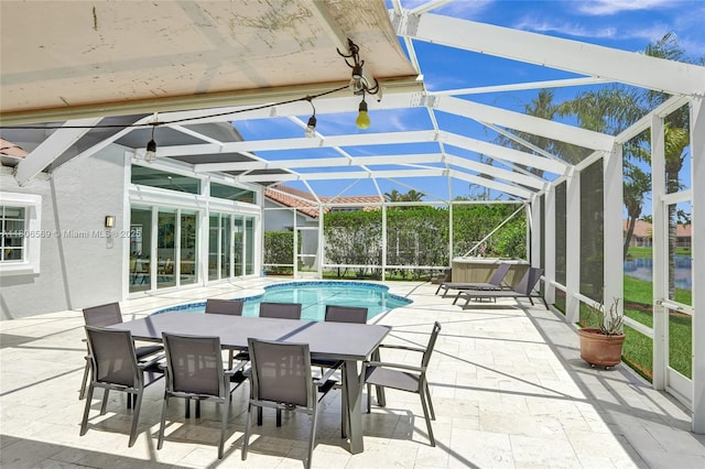 594 Spinnaker, Weston, FL 33326 - view of pool featuring a patio area, outdoor dining space, and a lanai