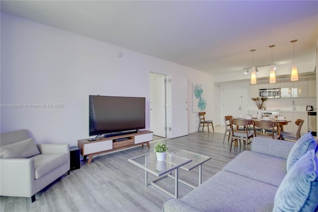 2602 E Hallandale Beach Blvd Unit R407, Hallandale Beach, FL 33009 - living area with wood finished floors