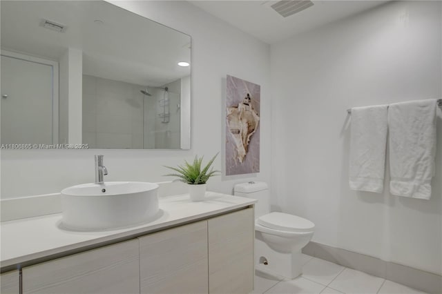 2602 E Hallandale Beach Blvd Unit R407, Hallandale Beach, FL 33009 - bathroom with tiled shower, toilet, tile patterned flooring, and vanity