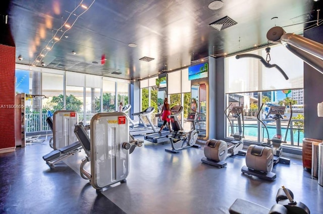 2602 E Hallandale Beach Blvd Unit R407, Hallandale Beach, FL 33009 - workout area with a wall of windows