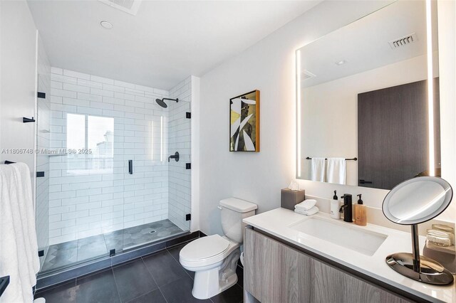 398 NE 5th St Unit 4518, Miami, FL 33132 - full bathroom featuring tile patterned flooring, toilet, a shower stall, and vanity