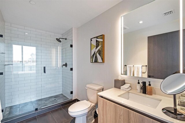 398 NE 5th St Unit 4518, Miami, FL 33132 - full bathroom featuring toilet, a stall shower, tile patterned floors, and vanity