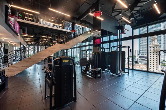398 NE 5th St Unit 4518, Miami, FL 33132 - exercise room with a wall of windows and a view of city