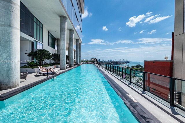 398 NE 5th St Unit 4518, Miami, FL 33132 - community pool with a patio area and a water view