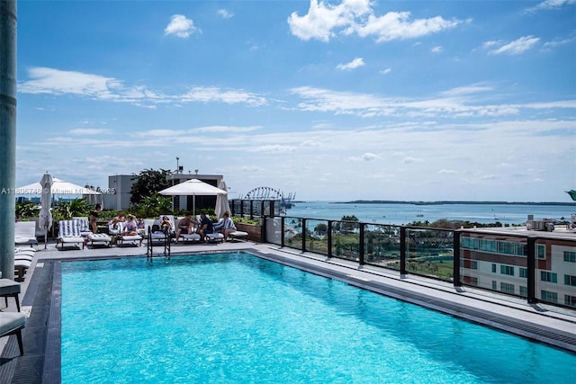398 NE 5th St Unit 4518, Miami, FL 33132 - community pool with a water view and a patio area