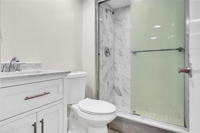100 Ashbury Rd Unit 103, Hollywood, FL 33024 - full bath with a marble finish shower, toilet, and vanity