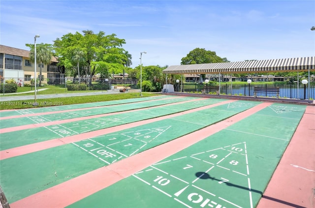 100 Ashbury Rd Unit 103, Hollywood, FL 33024 - view of home's community with shuffleboard and a water view