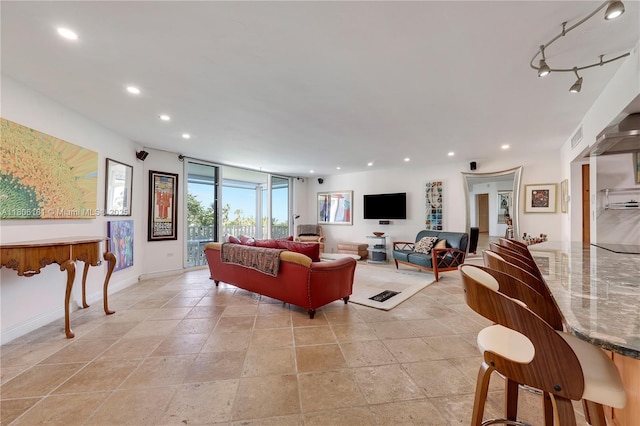 200 Ocean Lane Dr Unit 305, Key Biscayne, FL 33149 - living area with recessed lighting, stone tile flooring, and baseboards