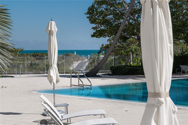200 Ocean Lane Dr Unit 305, Key Biscayne, FL 33149 - community pool featuring a patio