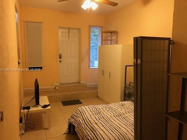 131 Carolina Ave, Fort Lauderdale, FL 33312 - tiled bedroom featuring ceiling fan