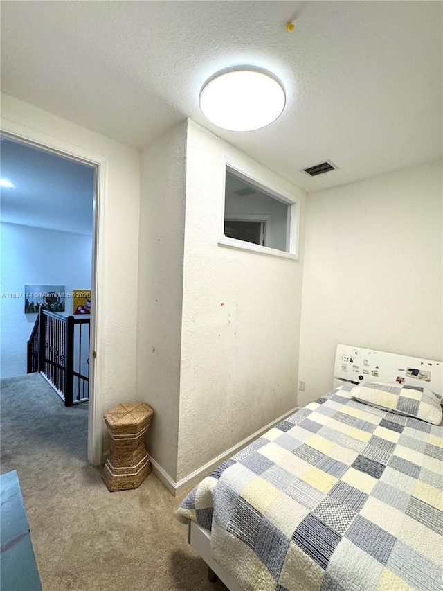 826 E Spinnaker Dr E, Hollywood, FL 33019 - carpeted bedroom featuring a textured ceiling