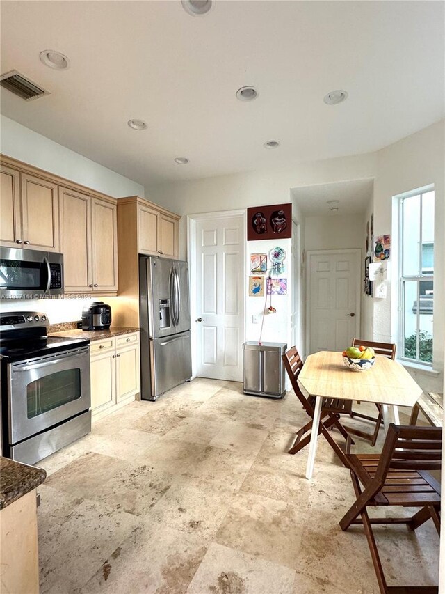 826 E Spinnaker Dr E, Hollywood, FL 33019 - kitchen featuring stainless steel appliances, recessed lighting, and light brown cabinets