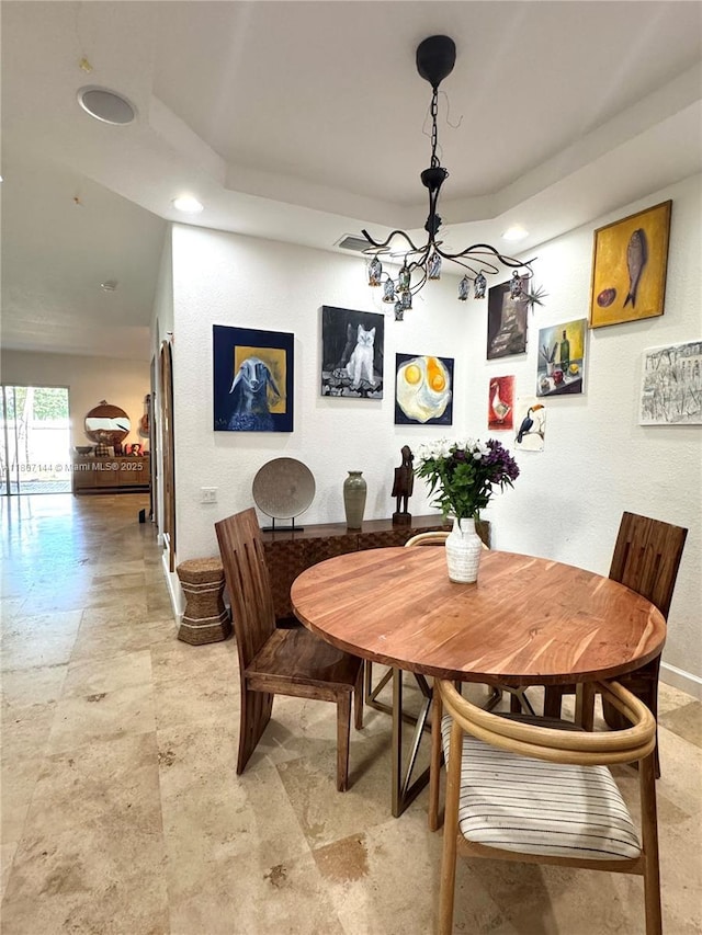 826 E Spinnaker Dr E, Hollywood, FL 33019 - dining space featuring a chandelier, recessed lighting, a raised ceiling, baseboards, and light stone finish flooring