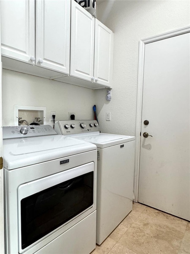 826 E Spinnaker Dr E, Hollywood, FL 33019 - washroom featuring cabinet space and separate washer and dryer