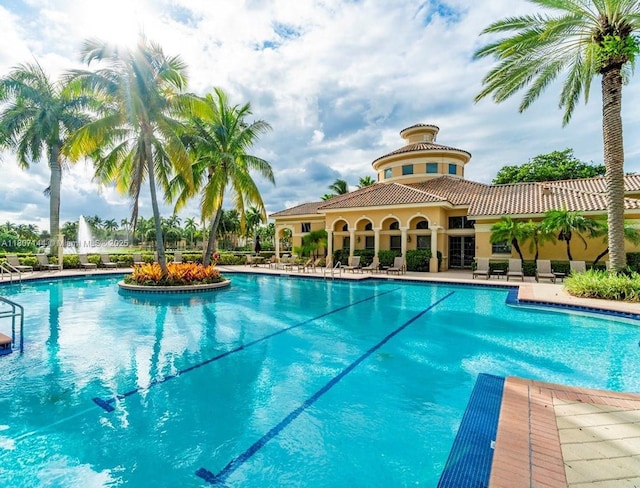 826 E Spinnaker Dr E, Hollywood, FL 33019 - community pool featuring a patio