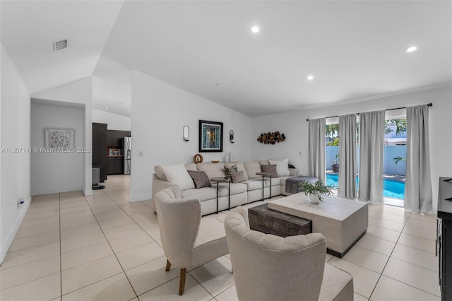 10020 SW 145th Pl, Miami, FL 33186 - living room with light tile patterned floors, recessed lighting, and vaulted ceiling