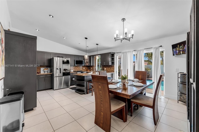 10020 SW 145th Pl, Miami, FL 33186 - dining space with lofted ceiling, a chandelier, light tile patterned floors, and recessed lighting