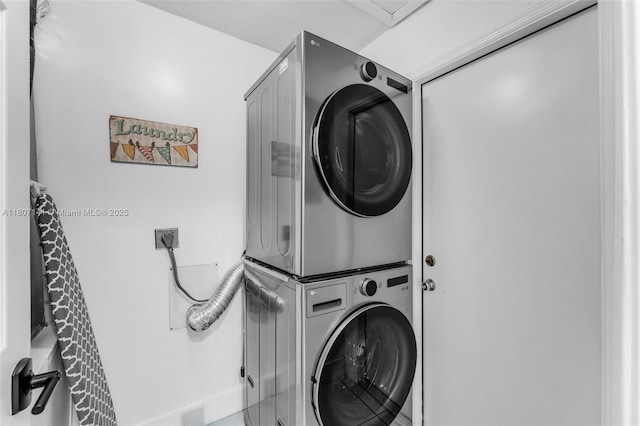 10020 SW 145th Pl, Miami, FL 33186 - washroom featuring stacked washer and clothes dryer