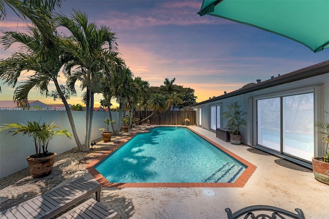 10020 SW 145th Pl, Miami, FL 33186 - view of swimming pool with a fenced backyard and a patio area