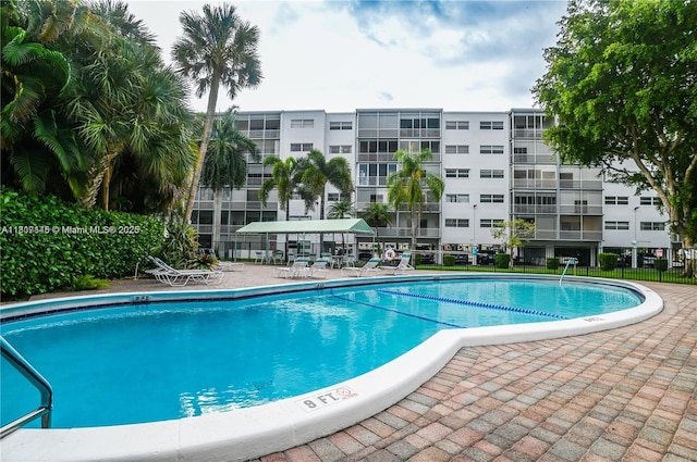 1425 Atlantic Shores Blvd Unit 204, Hallandale Beach, FL 33009 - community pool featuring a patio area