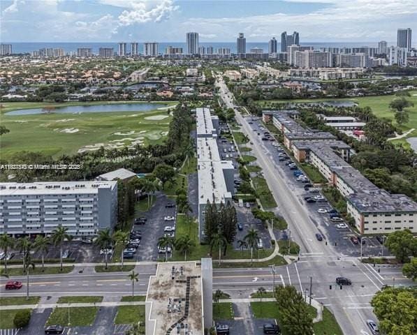 1425 Atlantic Shores Blvd Unit 204, Hallandale Beach, FL 33009 - aerial view of property and surrounding area with city skyline, a large body of water, and a golf club
