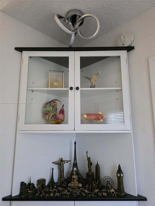 1425 Atlantic Shores Blvd Unit 204, Hallandale Beach, FL 33009 - detailed view of a textured ceiling, a ceiling fan, and a smoke detector