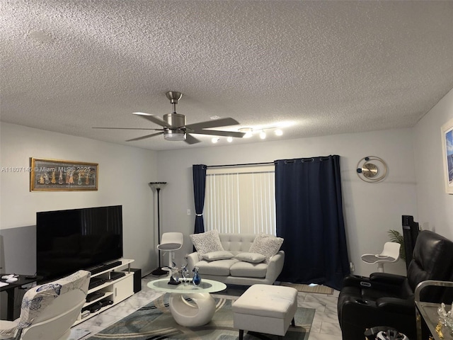 1425 Atlantic Shores Blvd Unit 204, Hallandale Beach, FL 33009 - living area with light marble finish flooring, ceiling fan, and a textured ceiling