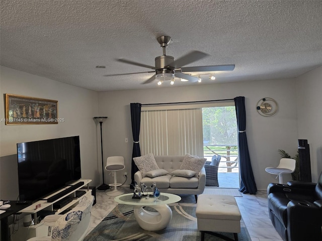 1425 Atlantic Shores Blvd Unit 204, Hallandale Beach, FL 33009 - living room with a ceiling fan, light marble finish flooring, and a textured ceiling