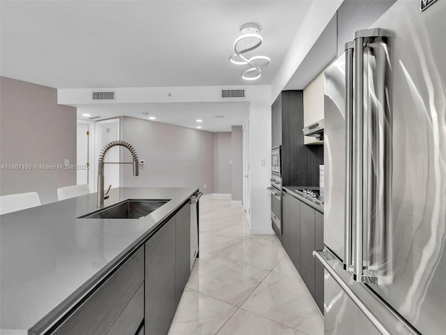 9821 E Bay Harbor Dr Unit 302, Bay Harbor Islands, FL 33154 - kitchen with stainless steel appliances, a sink, modern cabinets, and recessed lighting