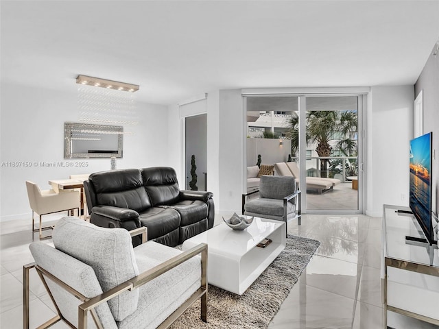9821 E Bay Harbor Dr Unit 302, Bay Harbor Islands, FL 33154 - living room with baseboards