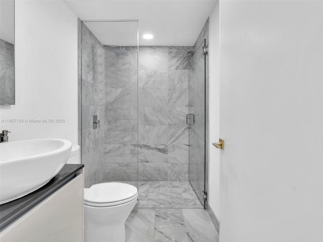 9821 E Bay Harbor Dr Unit 302, Bay Harbor Islands, FL 33154 - bathroom with marble look tiles, a marble finish shower, vanity, toilet, and recessed lighting