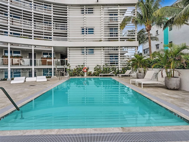 9821 E Bay Harbor Dr Unit 302, Bay Harbor Islands, FL 33154 - community pool with a patio