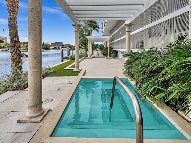 9821 E Bay Harbor Dr Unit 302, Bay Harbor Islands, FL 33154 - swimming pool featuring a patio, a water view, and a pergola