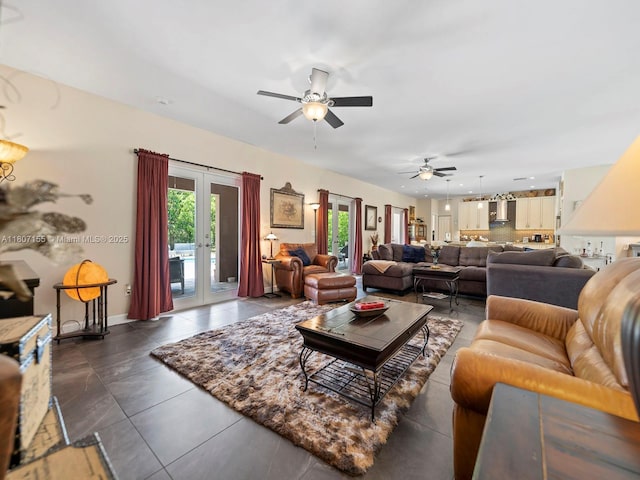 15150 SW 240th St, Homestead, FL 33032 - living room featuring a ceiling fan, french doors, recessed lighting, and dark tile patterned floors