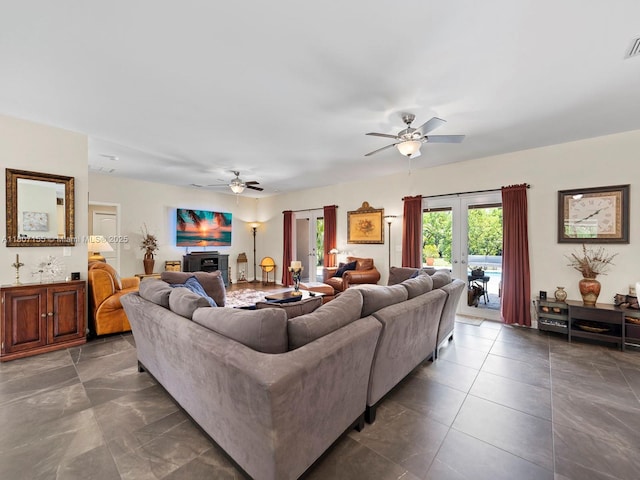 15150 SW 240th St, Homestead, FL 33032 - living area with a ceiling fan, a fireplace, and french doors