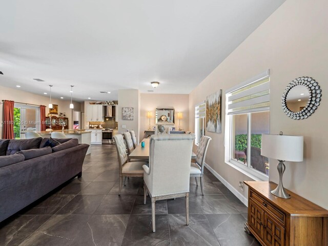 15150 SW 240th St, Homestead, FL 33032 - dining room with baseboards and recessed lighting