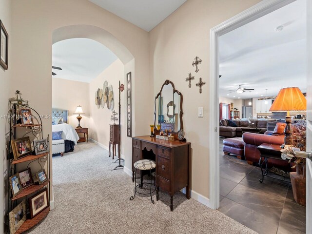 15150 SW 240th St, Homestead, FL 33032 - corridor with arched walkways and carpet flooring
