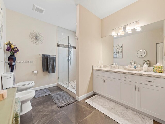 15150 SW 240th St, Homestead, FL 33032 - full bathroom featuring a bidet, a shower stall, vanity, and tile patterned floors